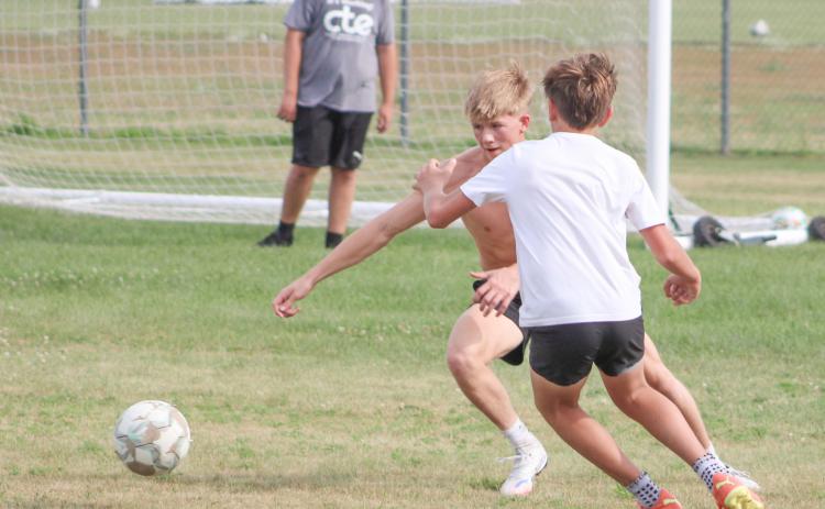 Brady Demory, one of just three seniors who have returned to the roster this season, makes a move at the first practice for the Gladwin soccer team Monday.