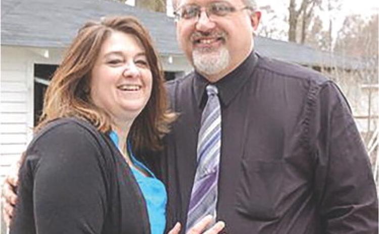 Gladwin Area Community Band director Ed Falls (right) and his wife Tammy Falls (left).