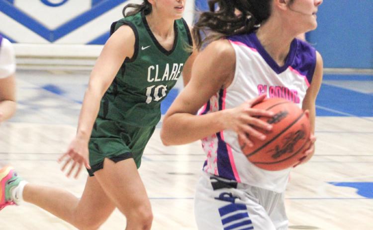 Gladwin’s Ava Gary hits the brakes and looks for an open teammate during Thursday’s loss to Clare.