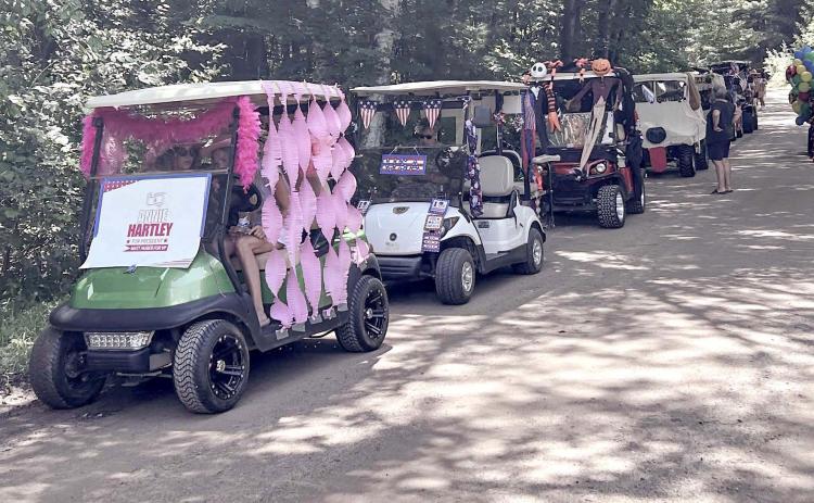 Wiggins Lake holds Golf Cart and Boat Parades