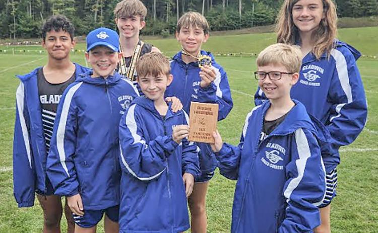 The Gladwin Junior High School boys team with their second place plaque.