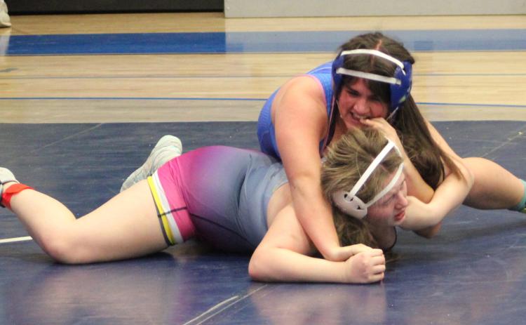 Gladwin’s Izzy Searfoss placed third at 170 at the Regional Sunday to qualify for the state meet.