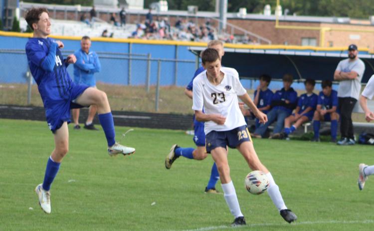 Gladwin’s Brian Tyrrell gets airborne to try and make a play during last week’s loss to Jack Pine Conference title contender Standish-Sterling.
