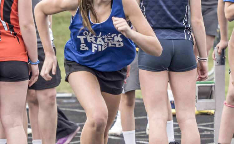 Gladwin’s Lily Hillier gets out of the blocks during Friday’s junior high track meet at Alma.