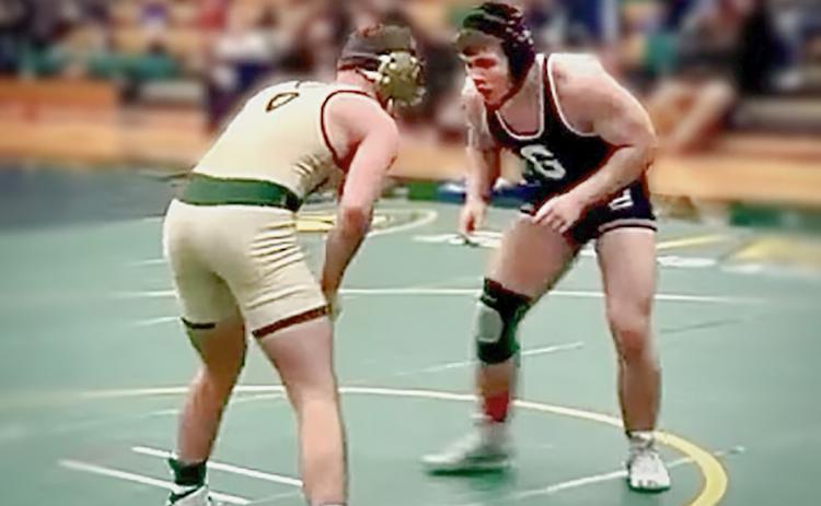 Gladwin’s Gaven Evans-Ferguson sizes up an opponent. The senior won the championship at the Traverse City West Holiday Invitational Thursday.