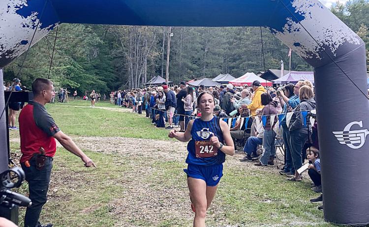 Gladwin’s Vivian O’Callaghan finishes first among her teammates again during a race earlier this season. The junior earned All-Jack Pine Conference Honorable Mention last week.