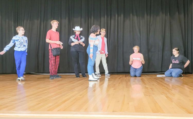 Beaverton Drama are pictured putting the finishing touches on their upcoming presentation.