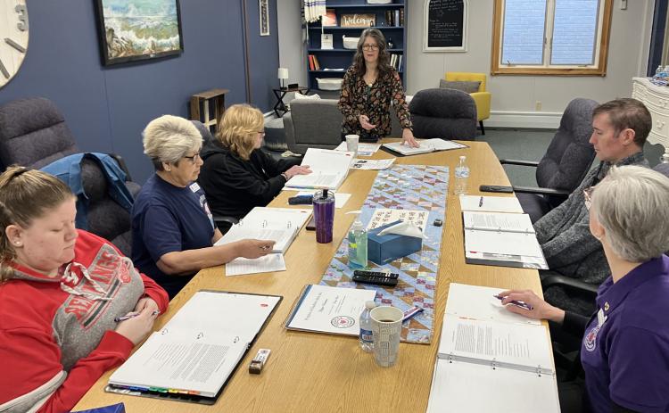 Kelly Como addresses a group of volunteers at a training session, which was held Friday by Hospice of Gladwin at Gladwin Free Methodist Church.