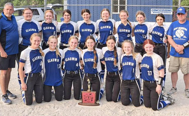 Team picture of the 2023 Lady G’s with the Jack Pine trophy after winning their second consecutive conference title.