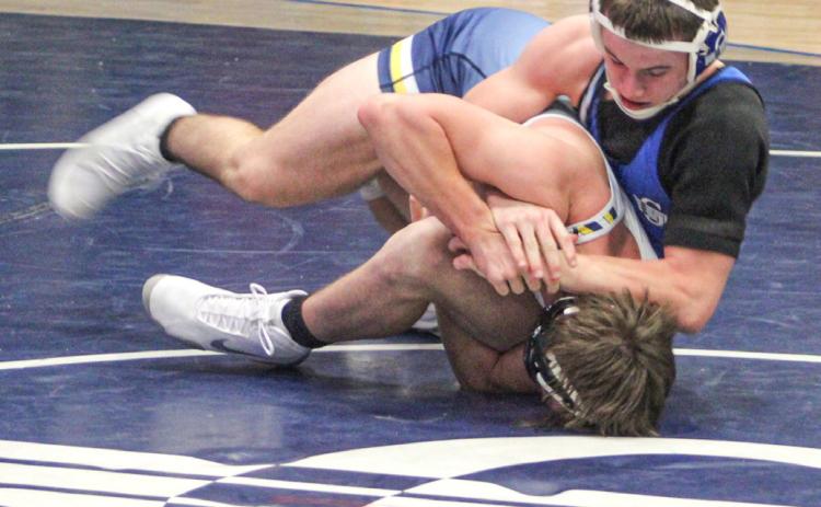 Gladwin’s M.J. McDonald got a grip on a silver medal at 144 Saturday at the Northern Michigan Championships in Gaylord.