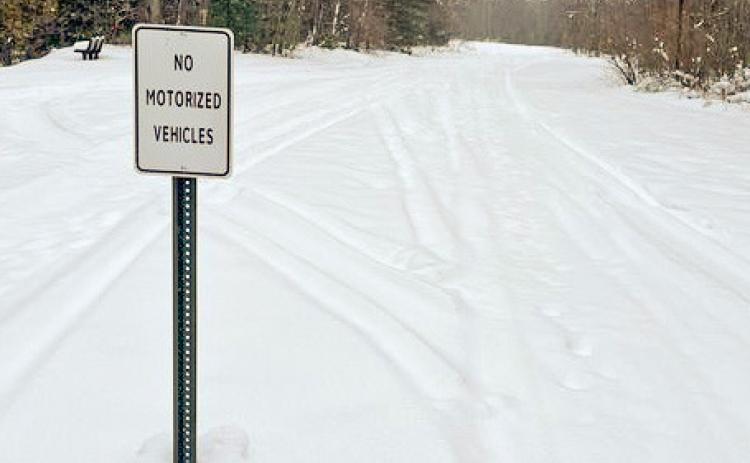 The sign that reads “No Motorized Vehicles” at the Trail of Two Cities Buckeye Trailhead on River Road.