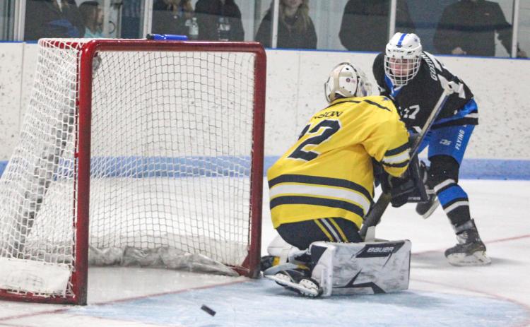Braeden Guzman had a hat trick in Gladwin’s win over the Mid-Michigan Raptors Saturday, even though this shot from the doorstep didn’t make it into the net.
