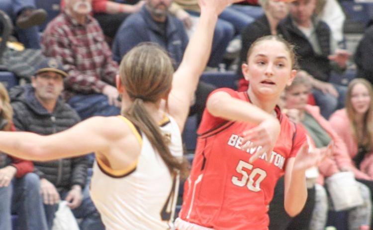 Beaverton’s Myah Hubble fires a pass right through the defense during Friday night’s 58-47 victory at Standish in a meeting of the top two teams in the Jack Pine Conference.