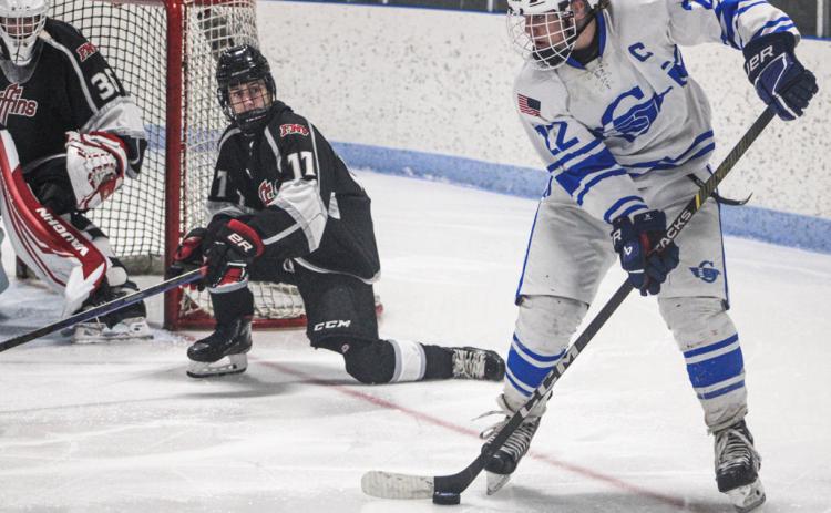 Gladwin’s Landin Woods loads up a back-hander during last Wednesday’s victory over the FNV Griffins.