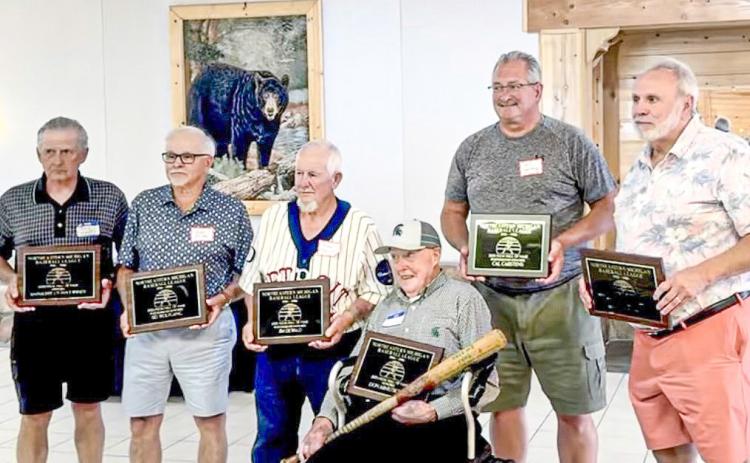 NEM Hall of Fame Baseball Inductees for 2025, are pictured left to right: Tony Windt, Gary Ozier (accepting posthumous award for Sid Wolfgang, Frank Gawlik (accepting posthumous award for Jim DeWalt), 97-year-old Don Armstrong with bat and plaque, William J. Carstens III accepting posthumous award for Cal Carstens, and Joe Pilot. PHOTO PROVIDED BY JACKIE CARSTENS