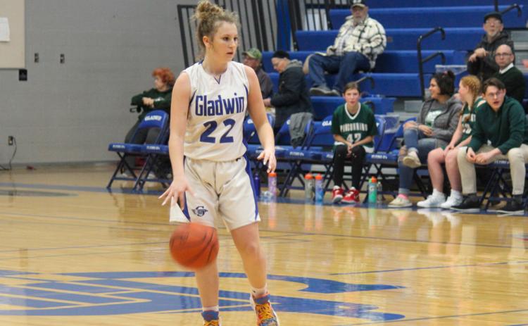 Gladwin’s Liz Winchester scans the court, looking over her options.