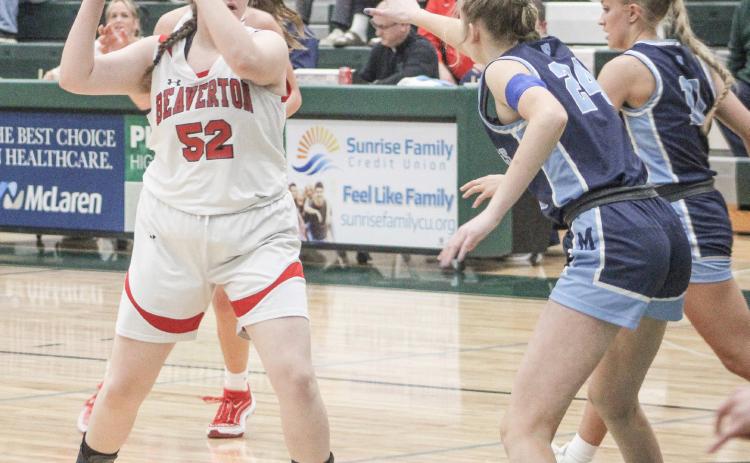 Beaverton’s Abby Northrup looks inside during last Wednesday night’s Division 3 district semifinal game against Meridian at Pinconning.