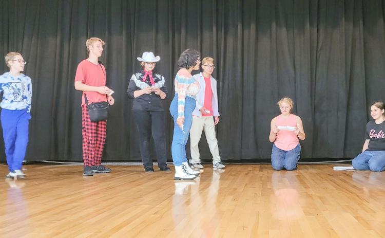 Beaverton Drama are pictured putting the finishing touches on their upcoming presentation.