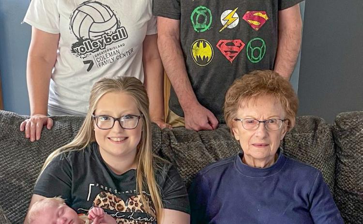 Pictured in front, Kloey McCully (holding Myles Mc-Cully), and Jacqueline Matteson, in back, Trish Day and Mike Matteson.