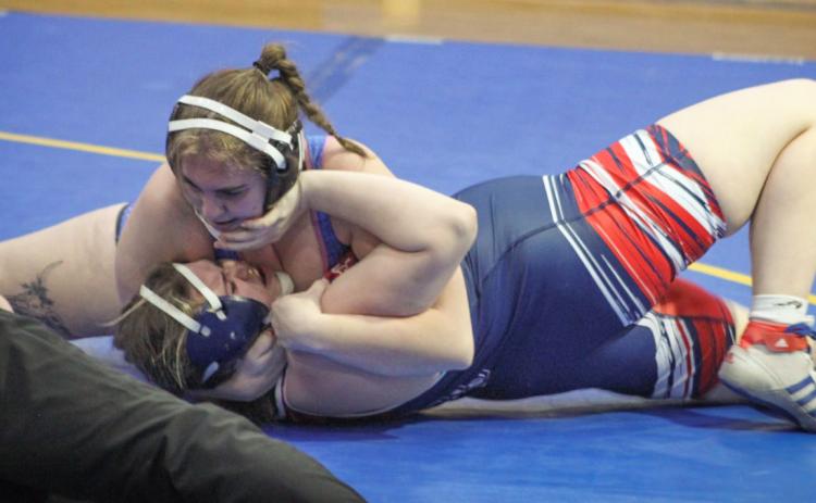 Gladwin’s Caiden Ross battles it out during a recent match. The Flying G’s opened the Jack Pine Conference dual meet season with a pair of wins last week.