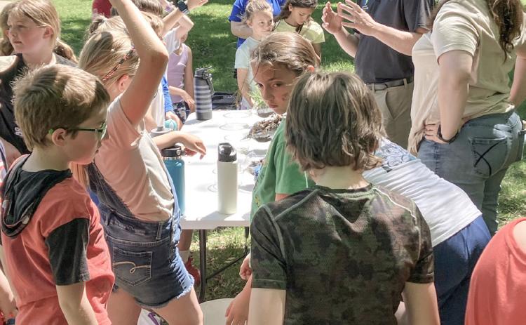 STUDENTS LEARN LESSONS IN CONSERVATION
