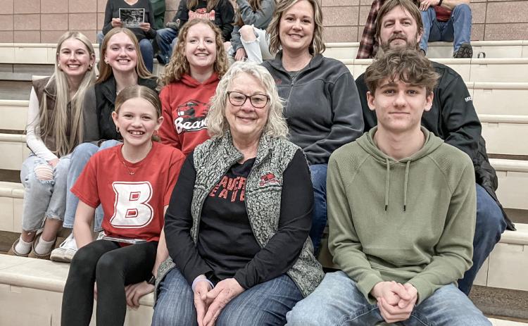 Viola Rusconi (back row, center), a participant in the Rotary Youth Exchange Program from Lecco, Italy, watches Monday night’s Beaverton basketball game with her hosts, the Stoike family. BEAVERTON