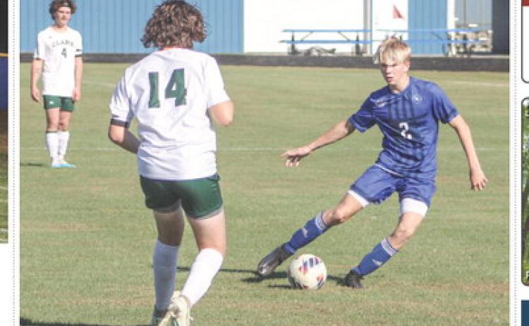 Gladwin’s Brady Demory puts the moves on the Clare defense during a recent game. The Flying G’s won big last Monday and lost in a similar fashion on Wednesday.