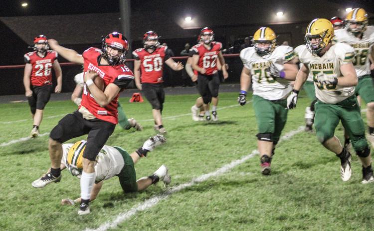 Beaverton’s offense attempts to get through McBain last Friday during the Division 7 district championship game.