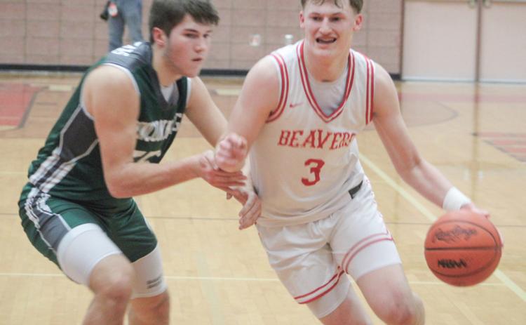 Beaverton’s Ian Roberts angles toward the paint during Friday night’s overtime victory over Pinconning.