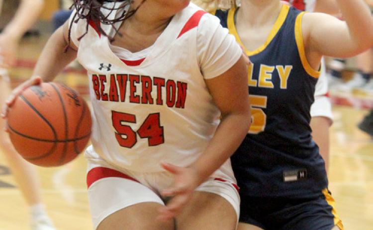 Beaverton’s Leiyah Mungin attempts to go around a Valley Lutheran defender.