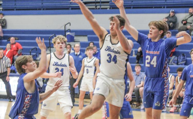 Gladwin’s Matthew Lechner kicks it outside during last Wednesday night’s victory over Remus Chippewa Hills.