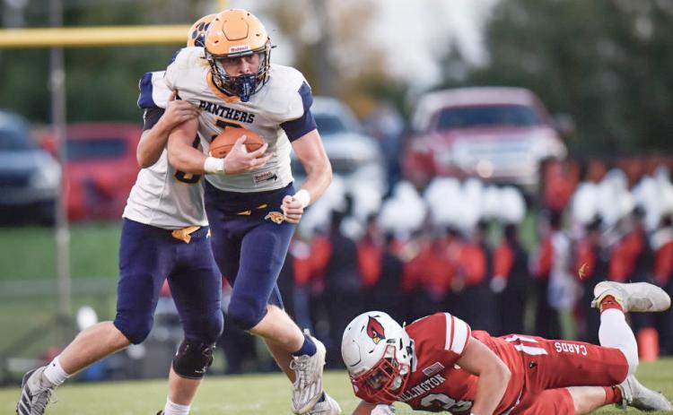 Joe Bellor takes the hand-off and looks for running room during Standish-Sterling’s 53-14 loss at Millington Friday night. PHOTOS COURTESY OF MINDY STOKOSZYNSKI