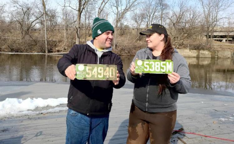 These porcelain license plates were retrieved from the Grand River in Lansing.