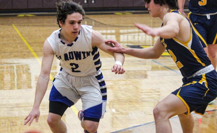 Brady Gehrett works his way around a Standish-Sterling defender.