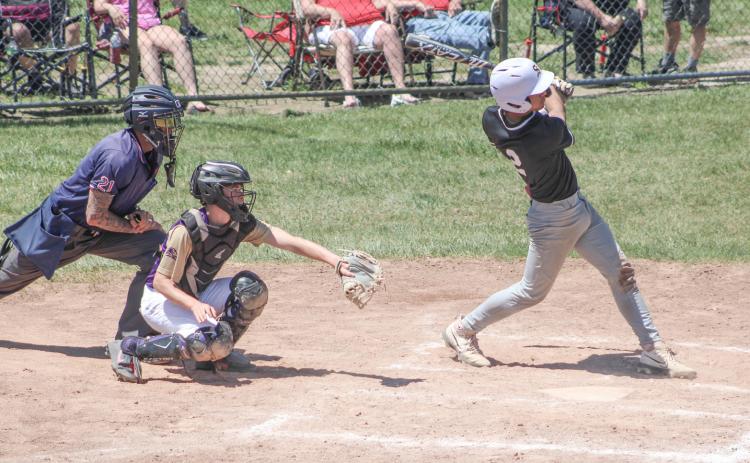 Sean Barta rips a hit during Beaverton’s Division 3 district semifinal victory over Farwell Friday.