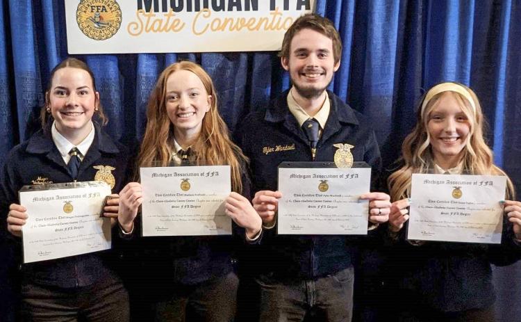 Pictured left to right: Megan Veitengruber (Clare High School), Madison Forfinski, and Tyler Wardwell (Farwell High School), alongside Grace Taylor (Harrison High School), proud recipients of the State FFA Degree Certificate. Veitengruber and Forfinski were also presented with Gold Awards for Academic Excellence.